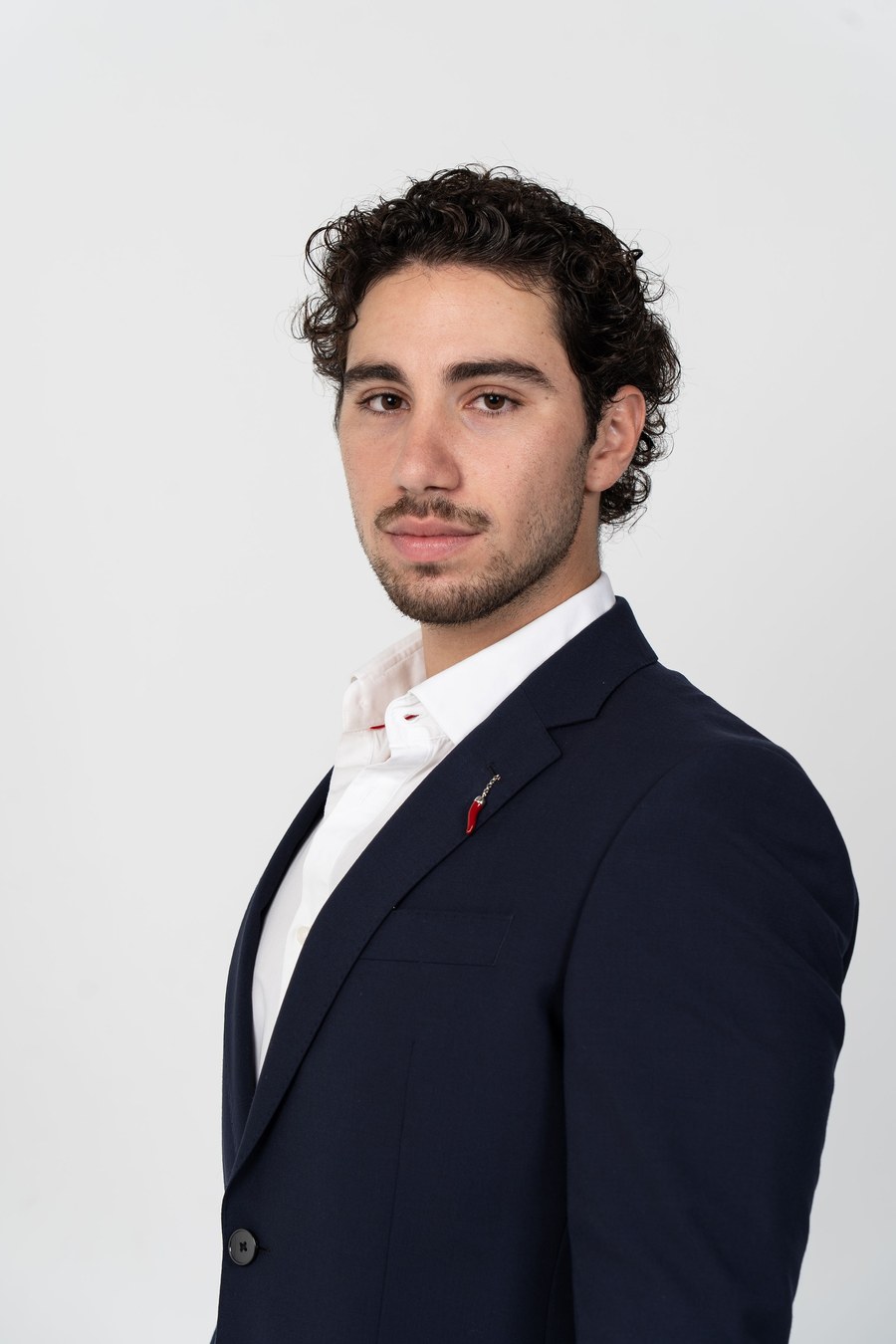 Alexandros Papadopoulos, final-year medical student and aspiring neurosurgeon, professional side-profile portrait